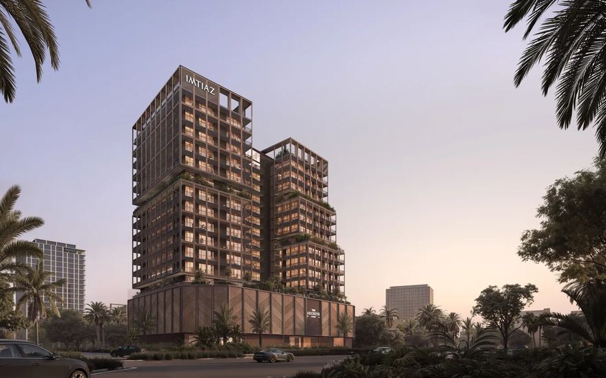 The Archive by Imtiaz — tower at dusk in Dubai Land Residence Complex
