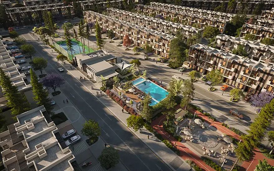 Reportage Hills — aerial view of the townhouse community and pool deck in Dubailand